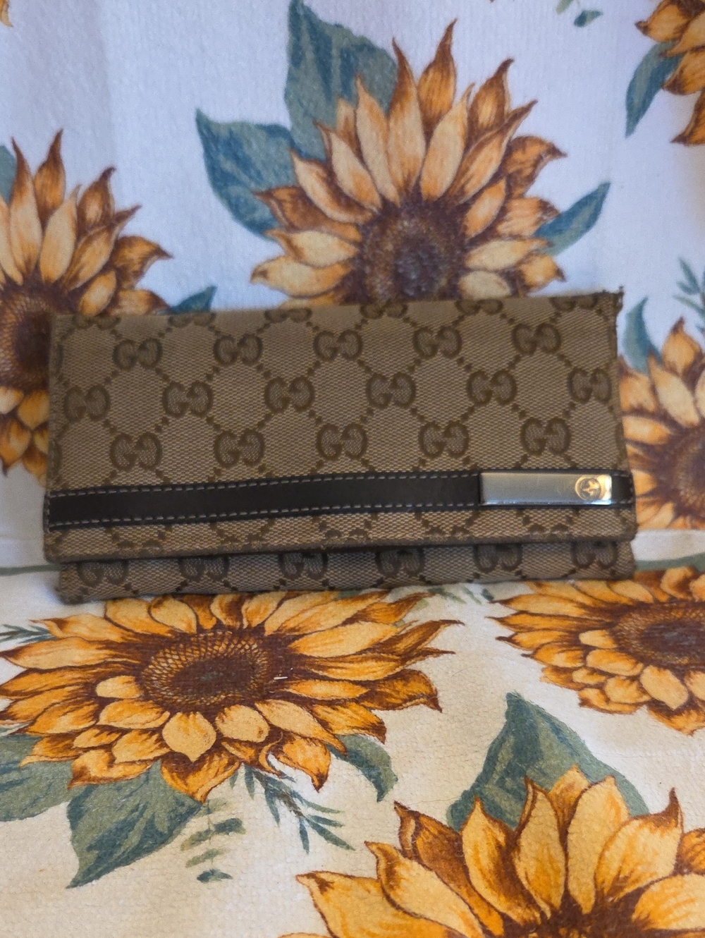 Gucci Brown GG Monogram Fold-Over Wallet with Black Trim and Gold Accent